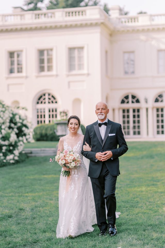French riviera inspired wedding at Wadsworth Mansion CT bride walking down the aisle