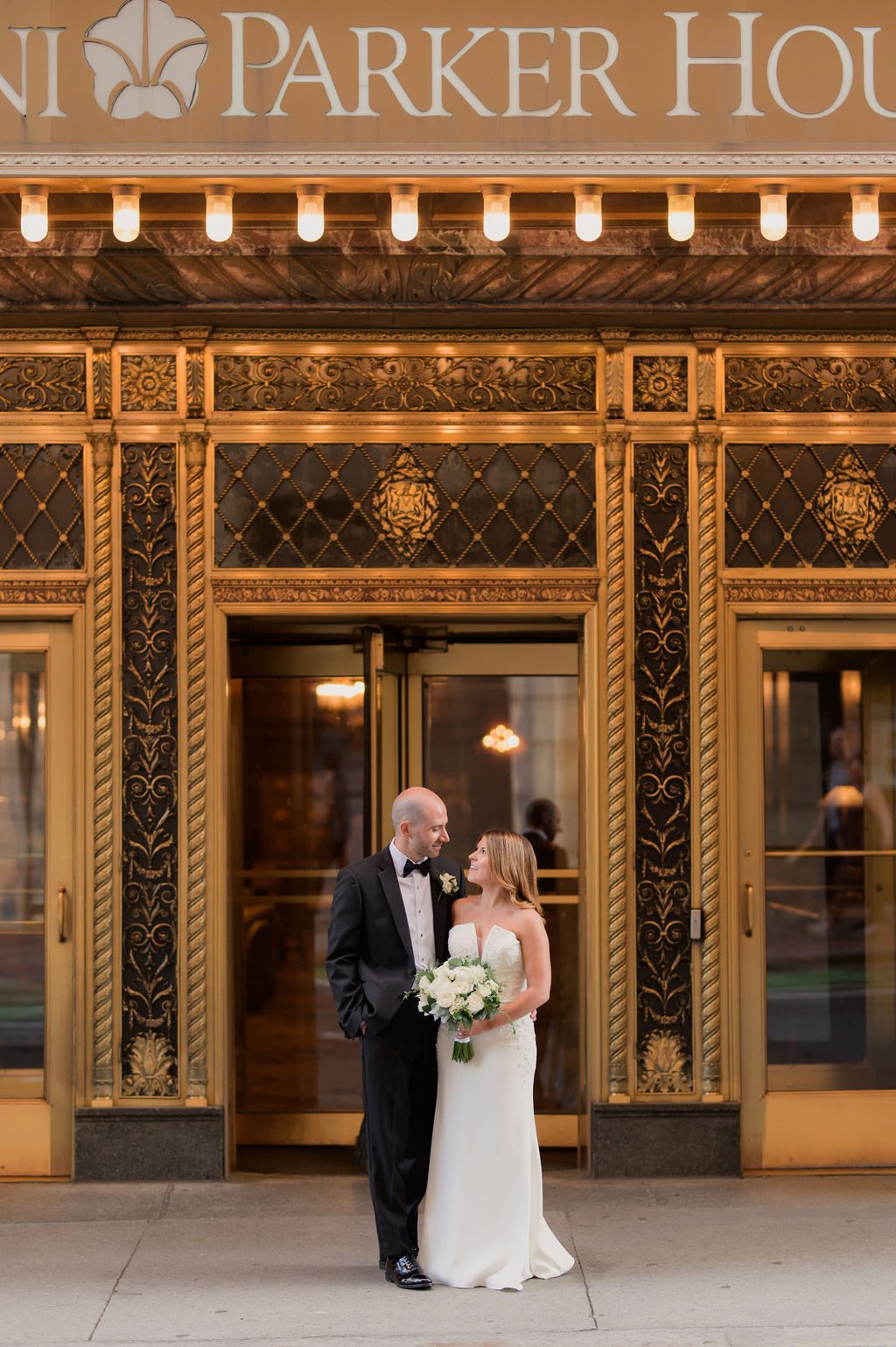 omni parker house wedding bride and groom portrait in front of hotel