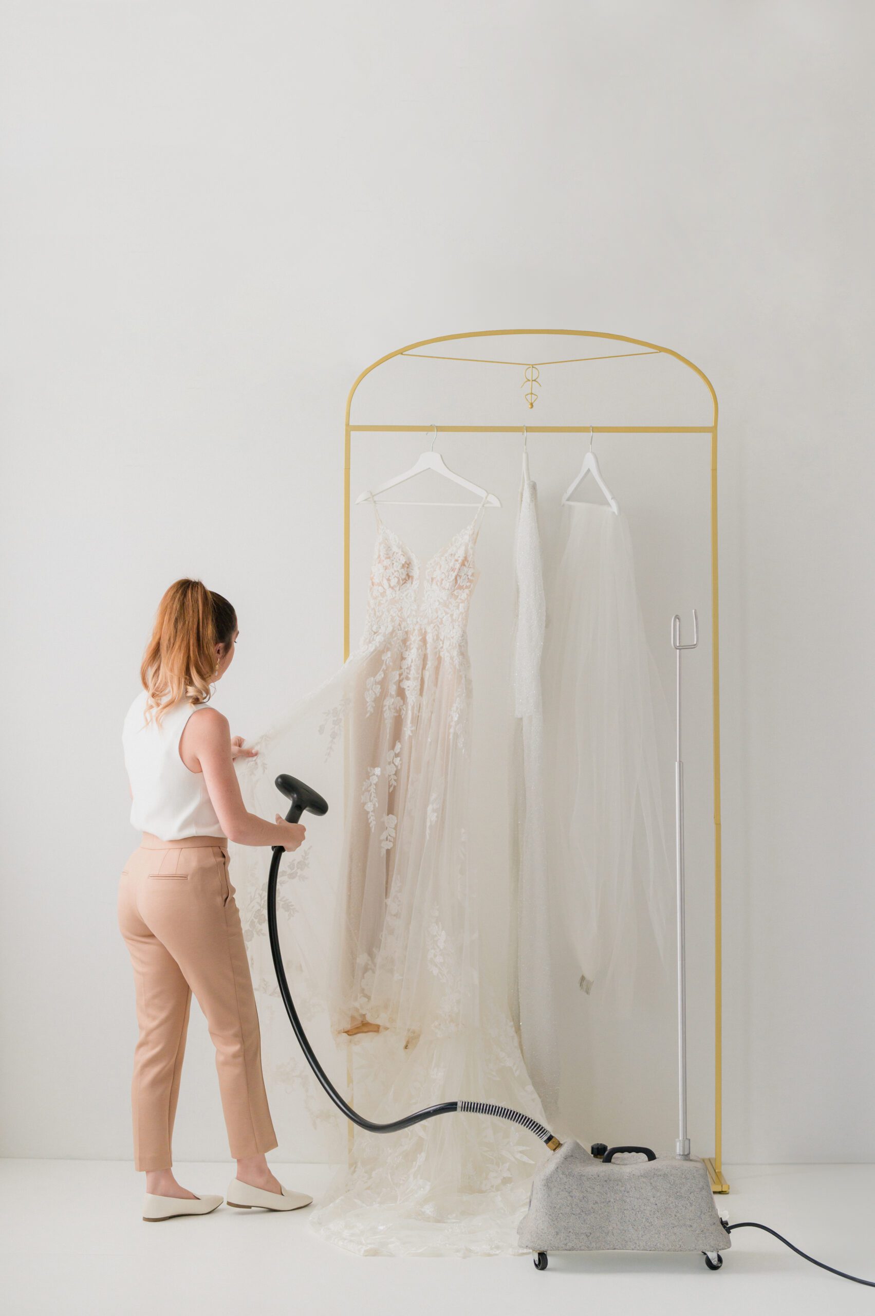 boston wedding content creator and stylist curated by seamless steaming a wedding gown